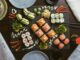sushi on black ceramic plate